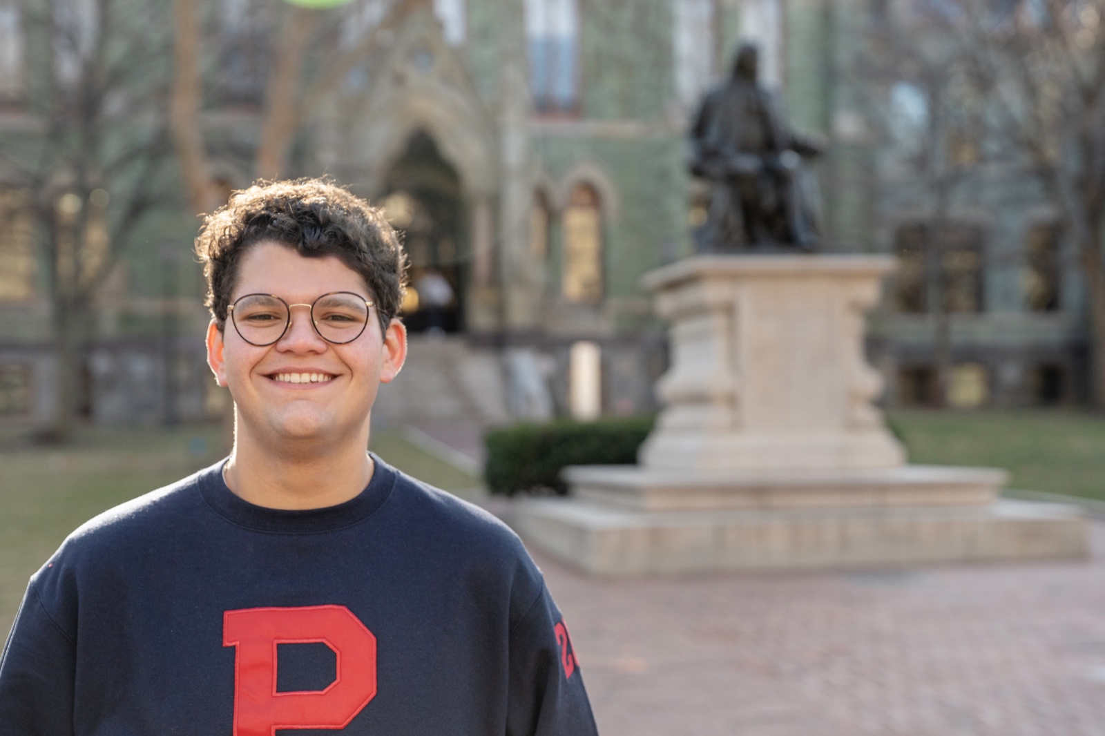 Noah Royal Milad smiling on the Penn campus