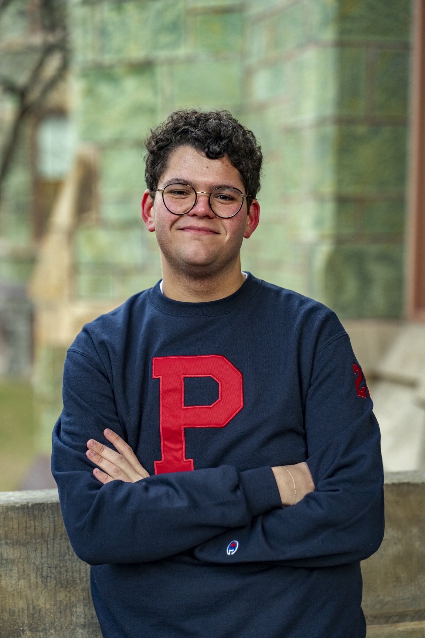 Portrait of Noah Royal Milad wearing a Penn sweatshirt
